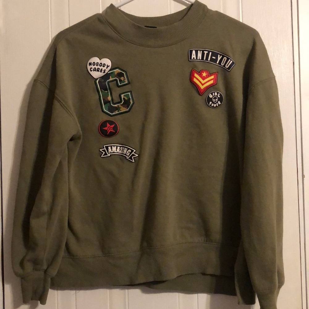 green sweater